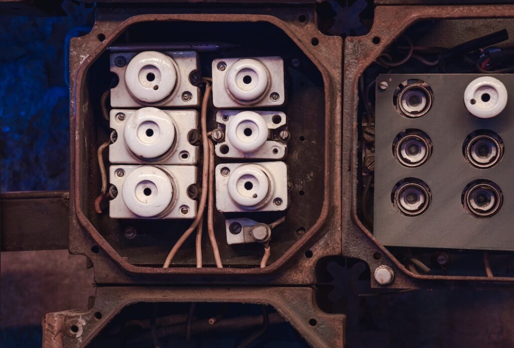 Fuse box with old knob and tube wiring.