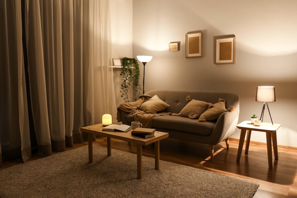 Stylish interior of living room at night